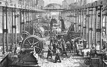Workers in the machine room of the Saxon machine factory