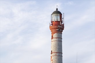 Weathered lighthouse in the evening light on Pakri Peninsula