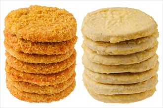 Stacks of semifinished frozen chicken and fish cutlets