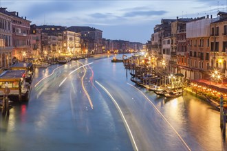 View of the Grand Canal from the Rialto Bridge in the evening