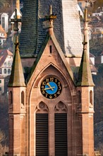 Blue church clock in church tower