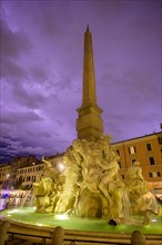 Four-flow fountain in Piazza Navona during a thunderstorm