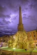 Four-flow fountain in Piazza Navona during a thunderstorm