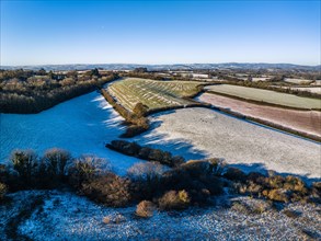 Fields and Farms shrouded in frost from a drone