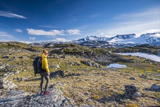 Hiker looking at Mount Fannaraki