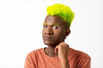 A gay black man in studio with white background