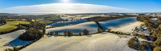 Panorama of Fields and Farms shrouded in frost from a drone