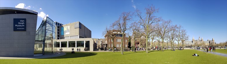 Panoramic photo of the modern architecture of the Van Gogh Museum building and park Museumplein