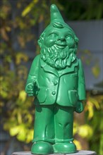 Green garden gnome designed by the artist Ottmar Horl
