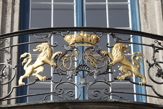 Coat of arms above the entrance door on the balcony of the town hall in Duesseldorf's old town