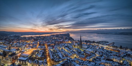 Aerial view of the town of Radolfzell on Lake Constance on a winter morning in front of sunrise