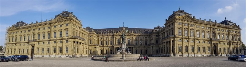 Panorama photo Frankoniabrunnen on the side of the Ehrenhof and Wuerzburg Palace Wuerzburg Residence and Court Garden