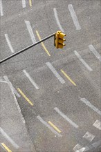 View from above of a street with a traffic light