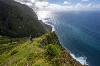 Tourist standing on a cliff