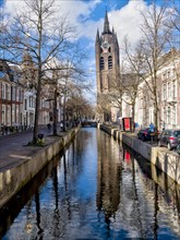 Oude Kerk Reformed Church and Canal with Reflection