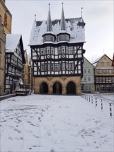 Half-timbered town hall in the snow