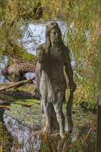 Hercules statue in the monastery pond