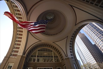 American flag in the arch of Rowes Wharf