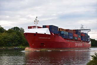 Container ship sailing in the Kiel Canal