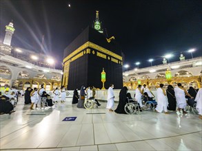 Pilgrims on the Kaaba