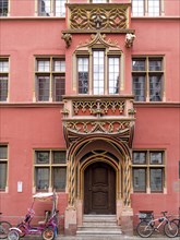 Detail of a red medieval building in the old town