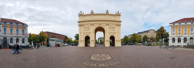 Panoramic photo of the classicist triumphal arch Brandenburg Gate at Luisenplatz