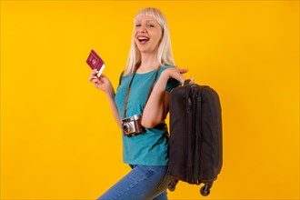 Portrait of tourist with suitcase