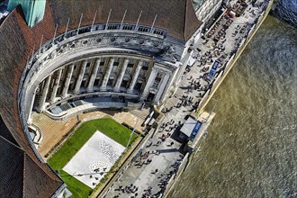 View from above County Hall and pedestrians on the Thames