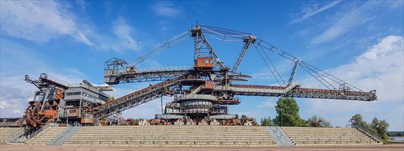 Panoramic photo of lignite excavator giants at the Ferropolis Industrial Heritage Open-Air Museum
