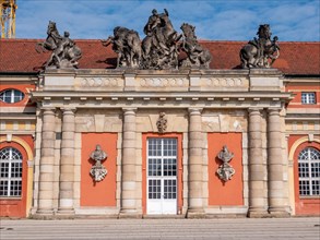 The opulent entrance door next to the entrance to the Filmmuseum Potsdam on Breite Strasse