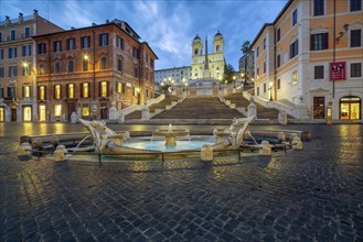 Piazza di Spagna with fountain at blue hour