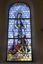 Coloured stained glass window with St. Elisabeth in the Church of Our Lady Mariae Namen
