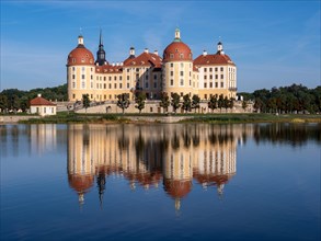 Hunting and baroque castle Moritzburg in the middle of castle pond lake