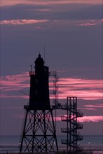 Lighthouse Obereversand in Dorum Neufeld at sunset