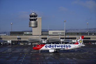 Control tower and aircraft Edelweiss Air