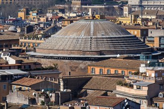 View from elevated position on historic dome of Pantheon Dome building from ancient Roman times of former Roman temple today Christian church rises above Roman old town