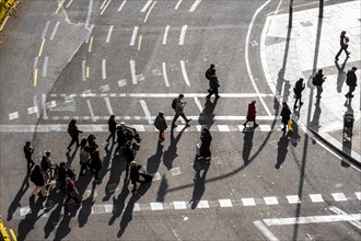 View from above of a street with a crowd of pedestrians in the city of Barcelona