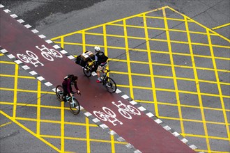 View from above of a street with an exclusive lane for bicycles in the city of Barcelona