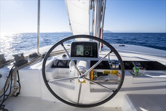 Steering wheel of a sailing catamaran while sailing