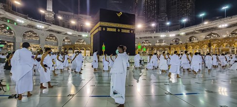 Pilgrims on the Kaaba