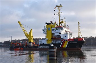 Coastguard vessel cleans water in Kiel Canal near Brunsbuettel