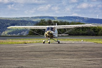 Light aircraft Comco Ikarus C42 Cyclone stands by at the airport