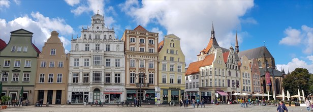 Panorama photo facade of colourful and old buildings in the Kroepeliner Strasse in the city centre