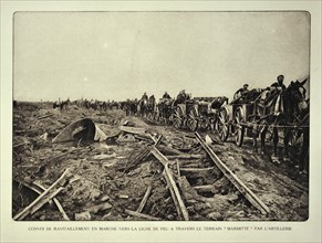 Supply convoy heading for the battlefield through bombarded terrain in Flanders during the First World War