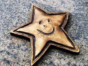 Laughing metal star