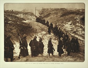 Infantry soldiers marching through the dunes in winter at De Panne in Flanders during the First World War