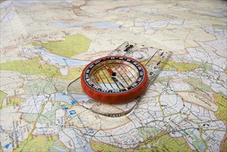 Magnetic compass on a map