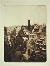 Soldier in trench checking with periscope where grenades strike in the battlefield at Diksmuide in Flanders during WWI