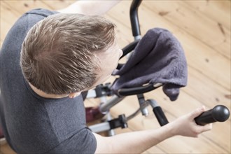 Man on the cross trainer