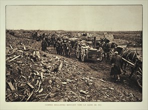 Supply convoy heading for the battlefield through bombarded terrain in Flanders during the First World War
